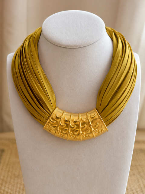 Chartreuse scarf with vintage pendant